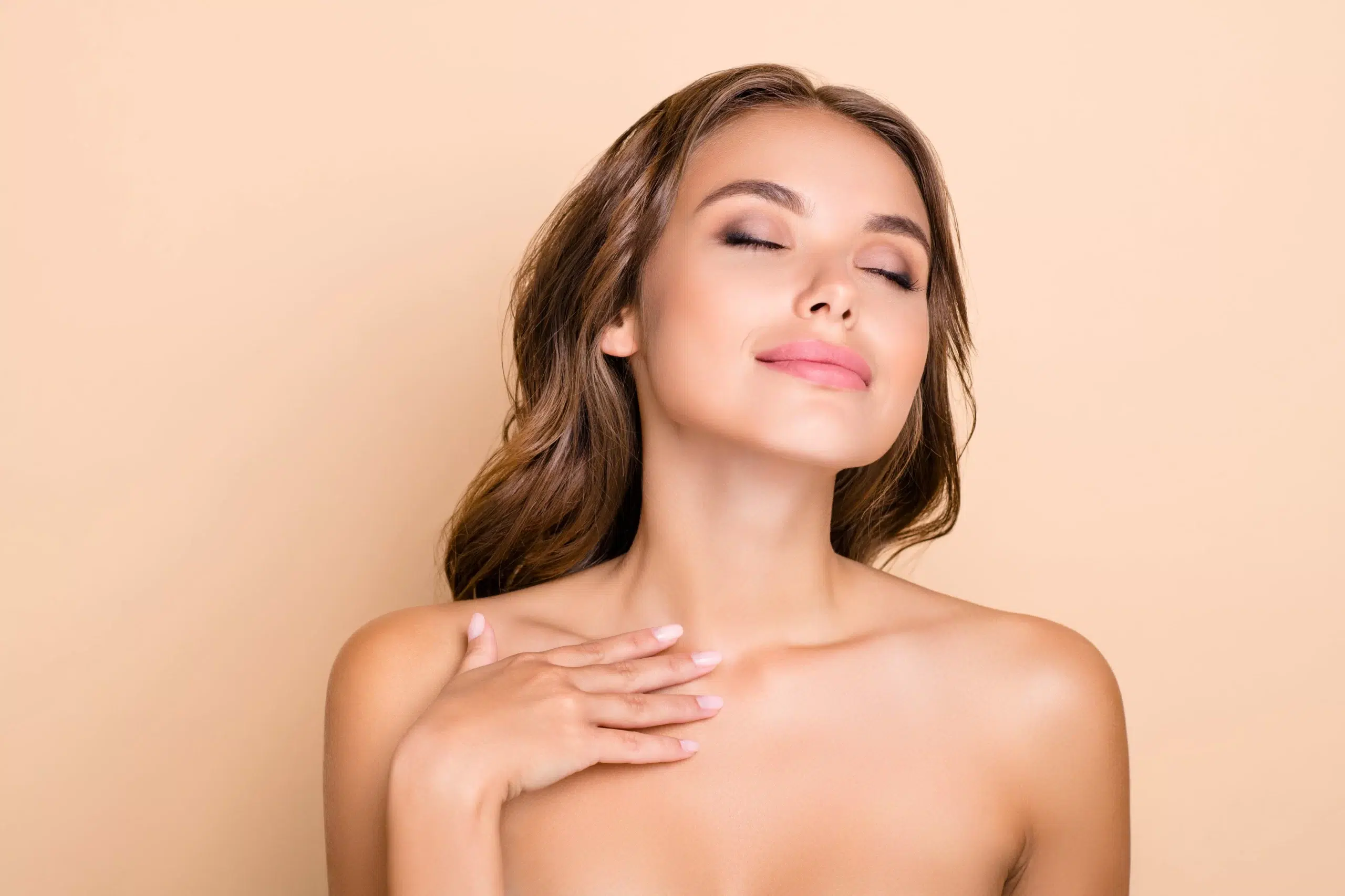 woman showing her chest that has been successfully treated for her chest veins