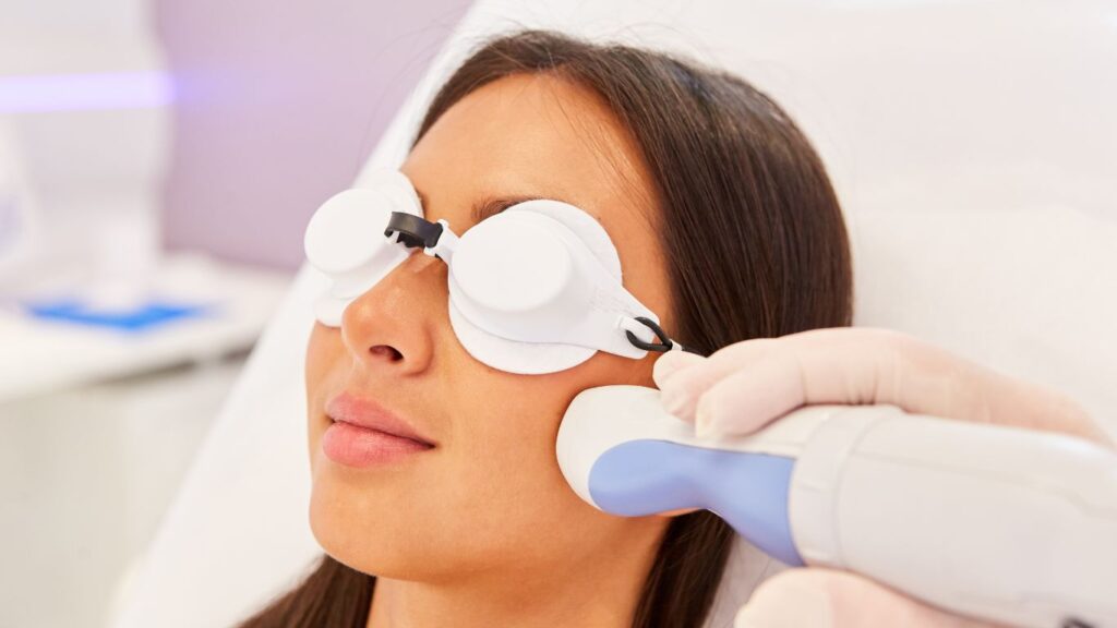 asian woman getting a laser deon on her face
